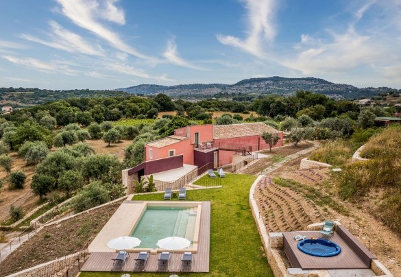 The pool area is located slightly above the villa - Villa Sumac