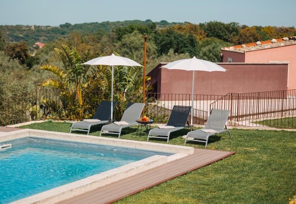 The pool area is located slightly above the villa - Villa Sumac