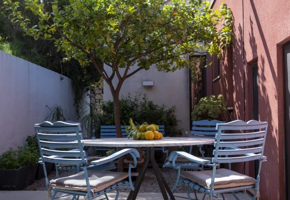 A few external steps lead to a more intimate dining area with a table for four - Villa Talia