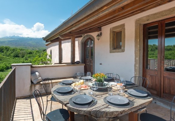 The outdoor eating space in the main house – Villa Terre Normanne