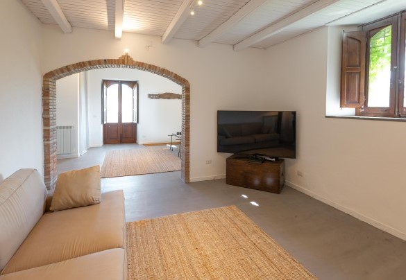 The TV lounge on the lower floor of the main house – Villa Terre Normanne