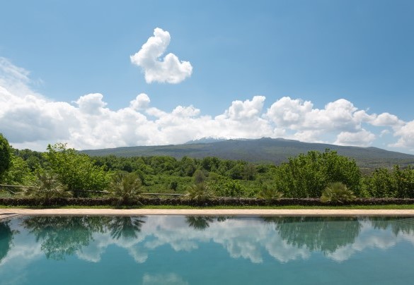 The beautiful view of Mount Etna from the pool – Villa Terre Normanne