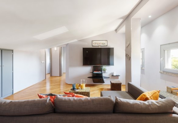 TV room furnished with comfortable sofas at the second floor – Villa Tiberio