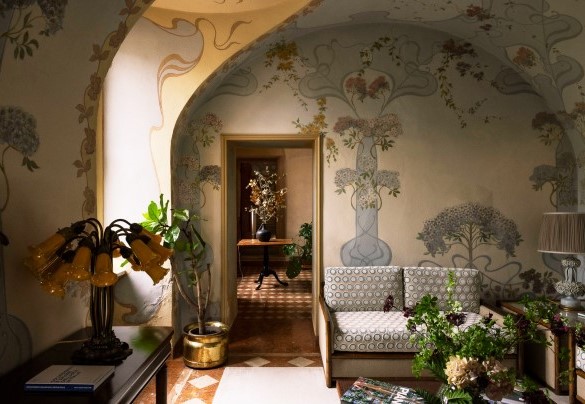The green living room connects to the dining room - Villa Torre di Terzolan