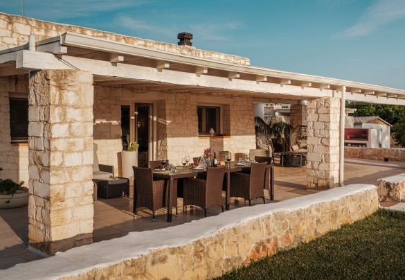 The outdoor dining table - White Stone House