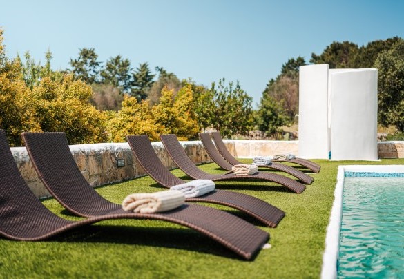 The pool sundeck area - White Stone House